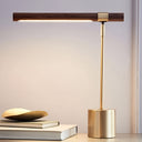 Lampe de table orientable dorée
